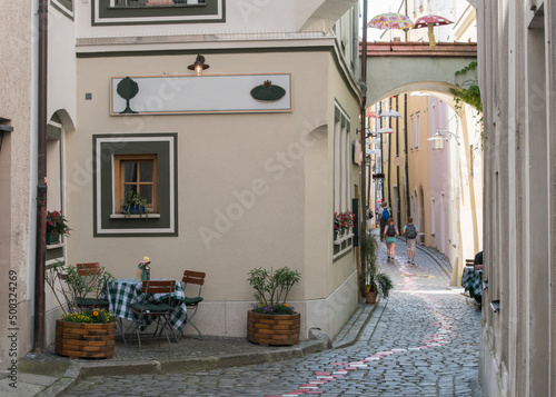 A quaint resting spot on the corner of a narrow street in Passau, Germany, awaits tourists who need a break.