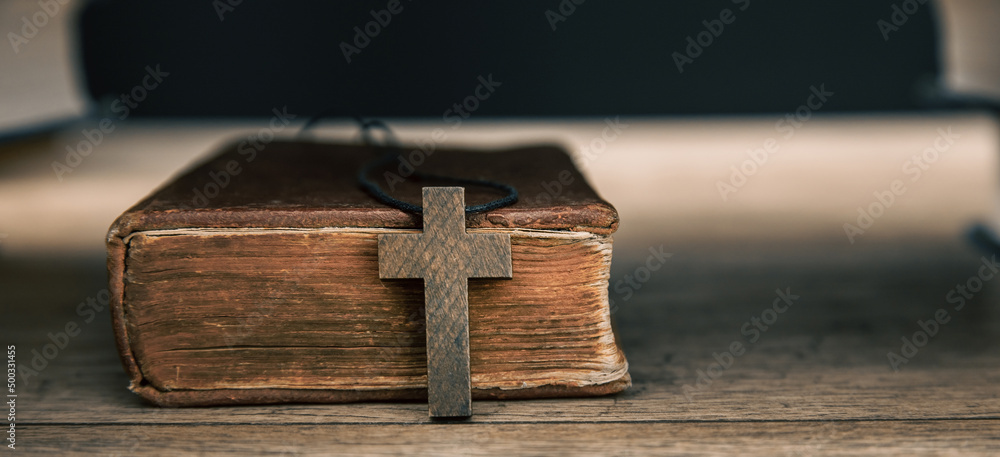 Holy Bible and wooden cross