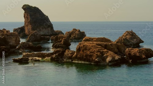The Atlantic coast on the Canary Island Tenerife in the evening hours in slow motion
The fantastic coastal landscape and the sea on Tenerife. Soft light, little swell, muted atmasphere and romance.