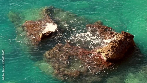 The Atlantic coast at the Canary Island Tenerife in the evening in slow motion 
The coastal landscape and the Atlantic Ocean at the popular vacation island Tenerife in the evening hours - slow motion