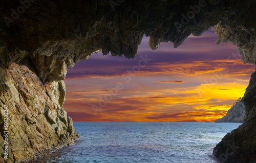 Picturesque waterfront caves at Mediterranean coast in summer