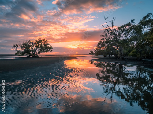 Seaside Sunrise with Cloud Rflections photo