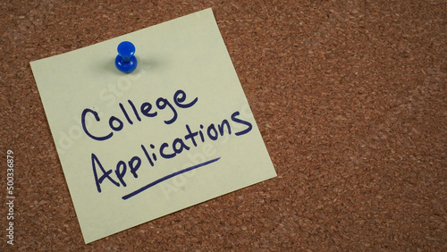 Note pinned to a cork board with a reminder about college applications