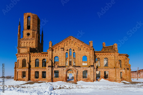 Old abandoned Lutheran church Messer Ust Zolich in winter photo