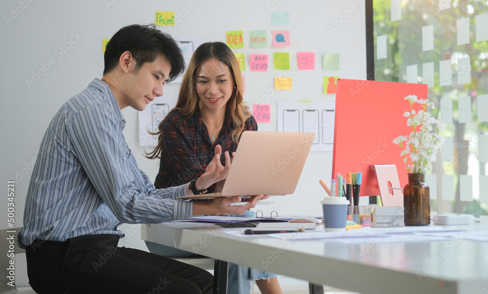 Team of professional web developers working on mobile application software design project at modern office. Team of professional web developers working on mobile application software design project at modern office.