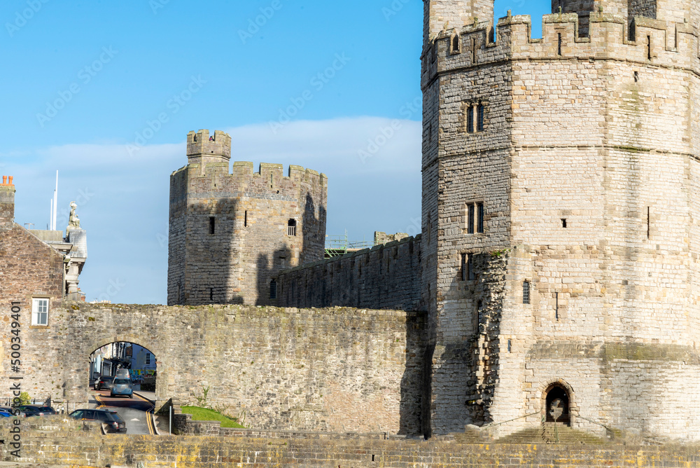 Caernarfon Castle,low angle view of exterior walls,Wales,United Kingdom. Caernarfon Castle,low angle view of exterior walls,Wales,United Kingdom.