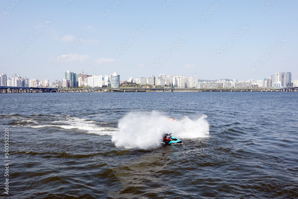 Fototapeta premium Jet ski on the Han River, Seoul landscape