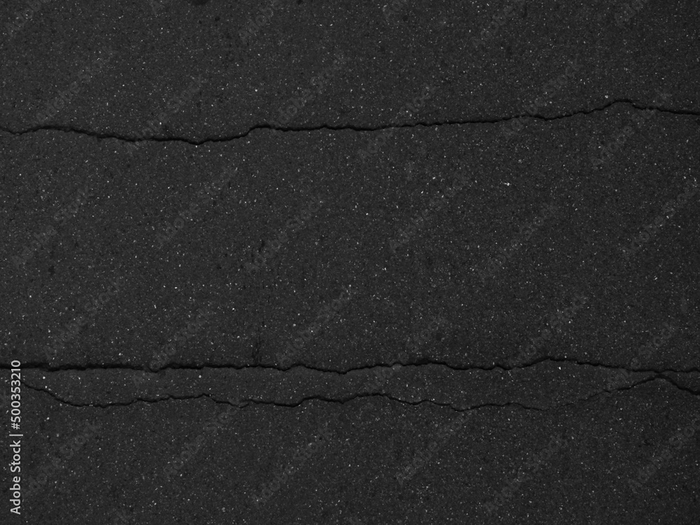 Obraz premium crack black asphalt road texture