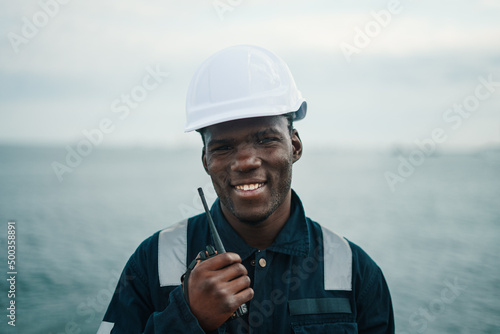 Seaman AB or Bosun on deck of vessel or ship smiling