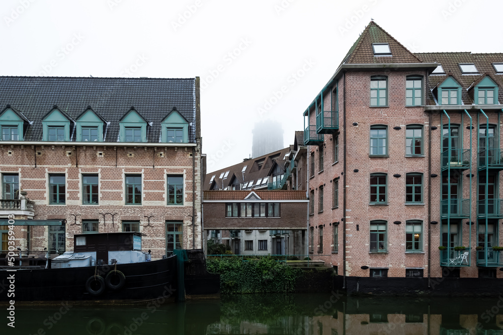 Architectural detail of the Haverwerf (oat yard), a street located at the banks of the river Dyle and an ancient trade market for oats in the city center of Mechelen, Belgium