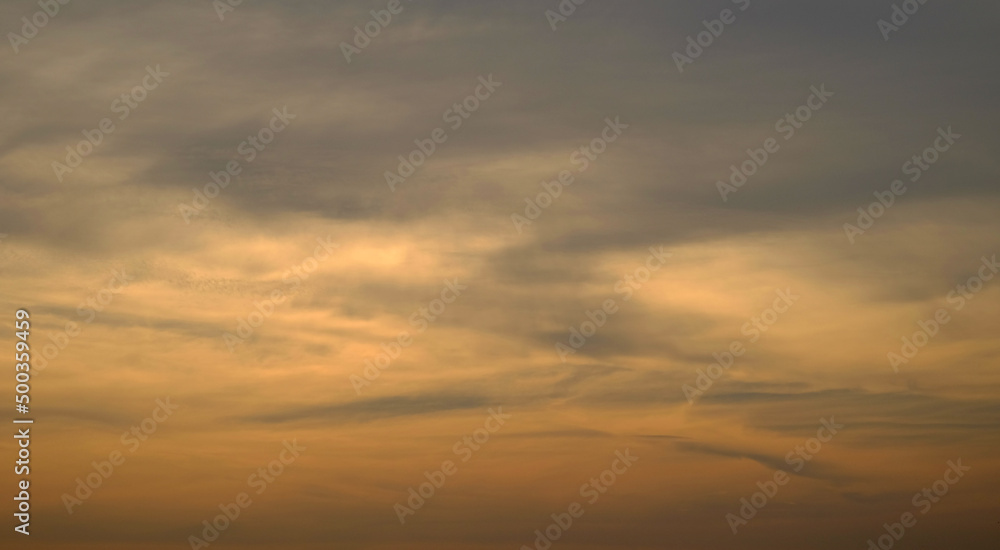 cloud in orange sky with sunlight at sunset, natural background