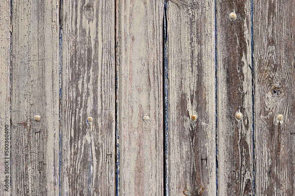 Background from a wall made of vertical wooden planks Background from a wall made of vertical wooden planks