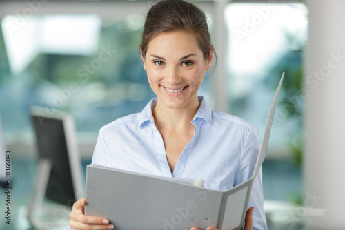 happy business woman with folder office tablet © auremar
