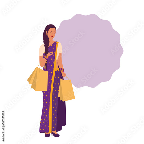 Young Pretty Indian Woman Standing And Holding Shopping Bags With Blank Circle Background. 