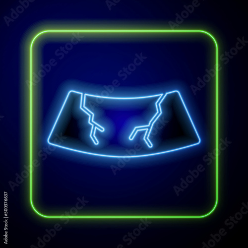 Glowing neon Broken windshield cracked glass icon isolated on blue background. Vector