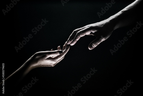 Hands at the time of rescue. Tenderness, tendet touch. Friends greeting, teamwork, friendship. Rescue, helping gesture or hands. Helping hand of a friend. Handshake, arms and friendship.