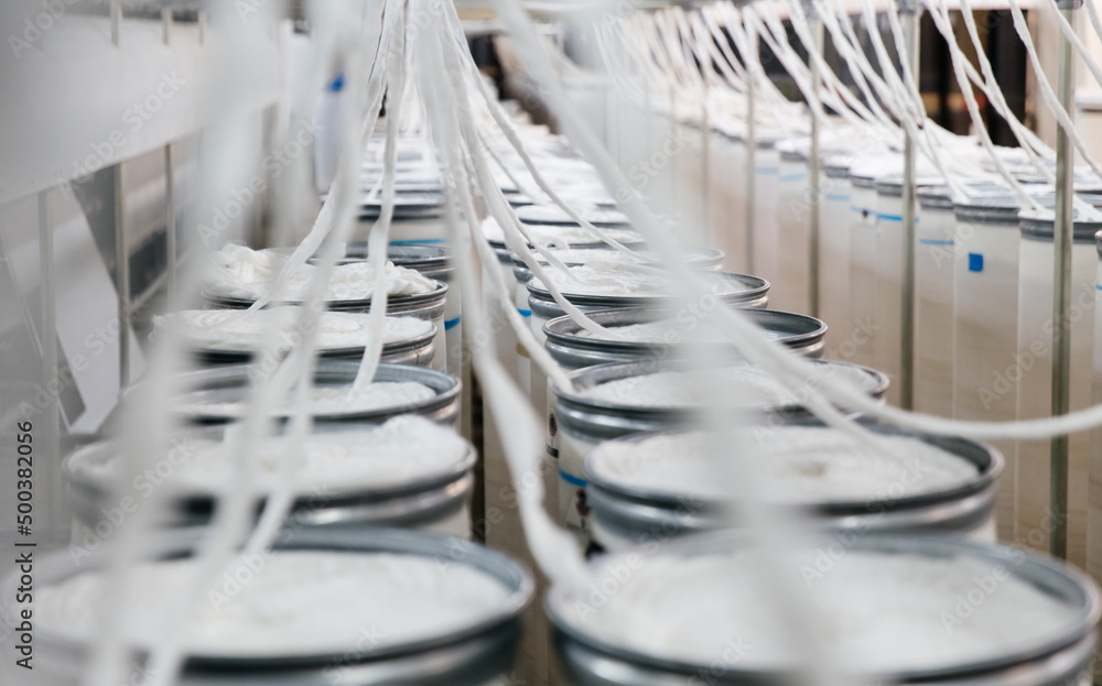 Fototapeta premium Spinning mill workshop, yarn production line.