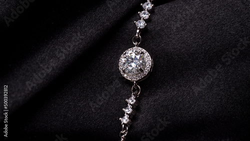 amazing silver diamond bracelet on a black background	