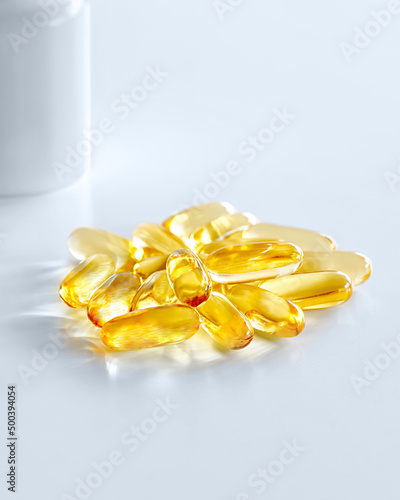 Closeup of a capsule with omega-3 oil