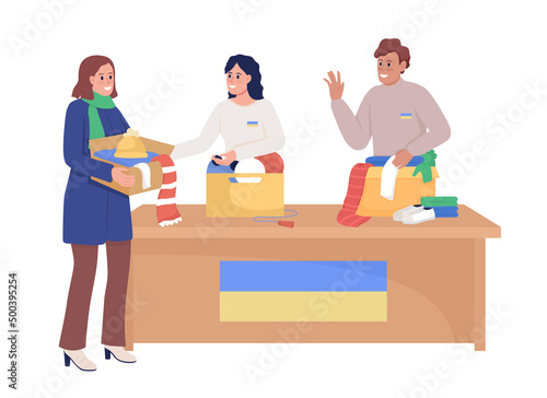 Volunteers collecting clothes for refugees semi flat color vector characters. Happy figures. Full body people on white. Simple cartoon style illustration for web graphic design and animation