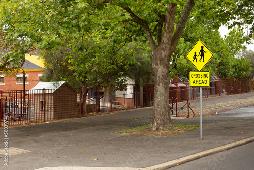 School crossing sign adjacent to a local school in the rural town of Ballarat