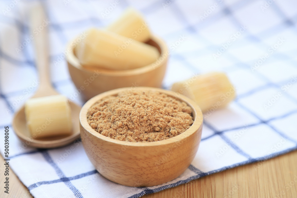 brown sugar powder from fresh organic sugar cane for being cooking ingredients for healthy eating. selective focus. brown sugar powder from fresh organic sugar cane for being cooking ingredients for healthy eating. selective focus.