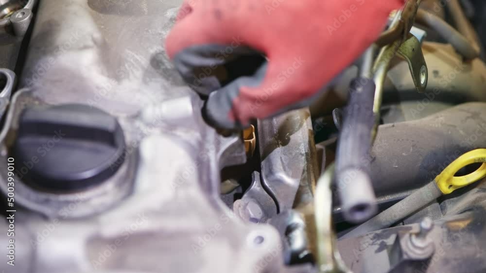 closeup car engine valvematic cover inside and outside, repairmen