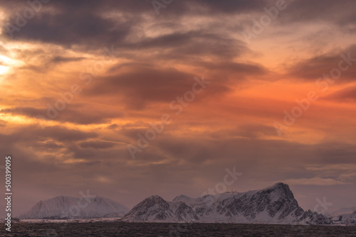 Norway mountains around the sea in the winter time