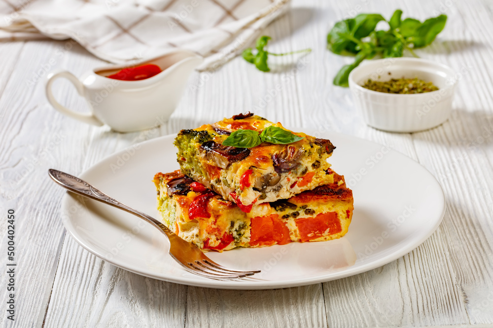 a portion of baked in oven vegetable frittata