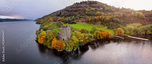 Obraz na plátne Aerial view of the ruins at Urquhart Castle at the Loch Ness during autumn sunse
