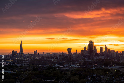 Colorful sunset view of the modern skyline of London, England, from Shoreditch, the City until Westminster