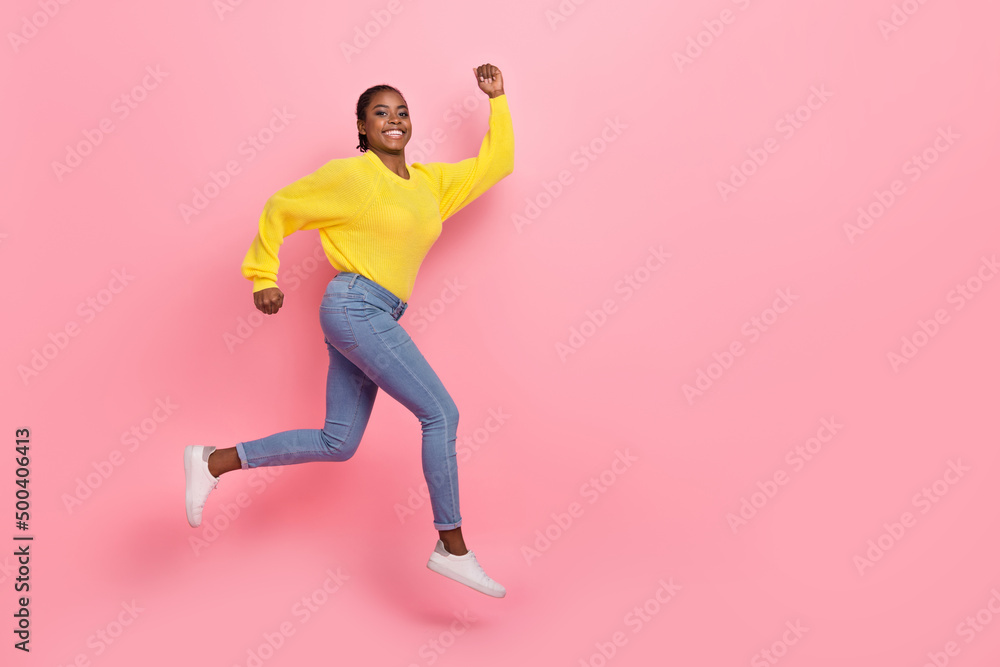 Full size profile side photo of young lady runner jumper hurry speed discount isolated over pink color background