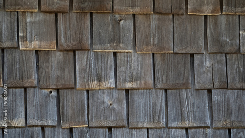 Wooden panels on a  facade  of a mountain house photo