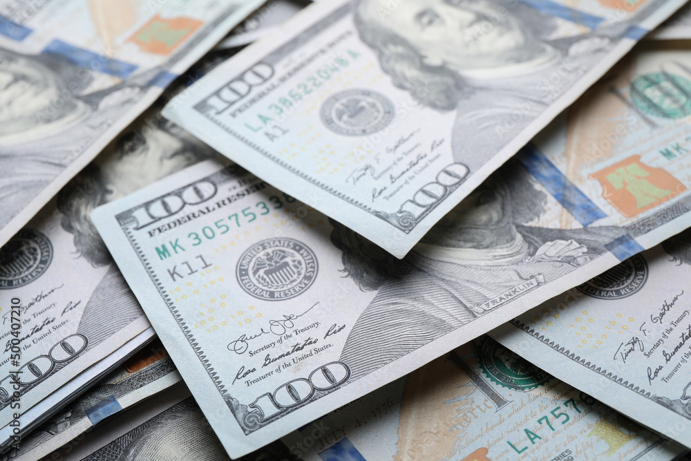 Dollar banknotes as background. Money and finance Dollar banknotes as background. Money and finance