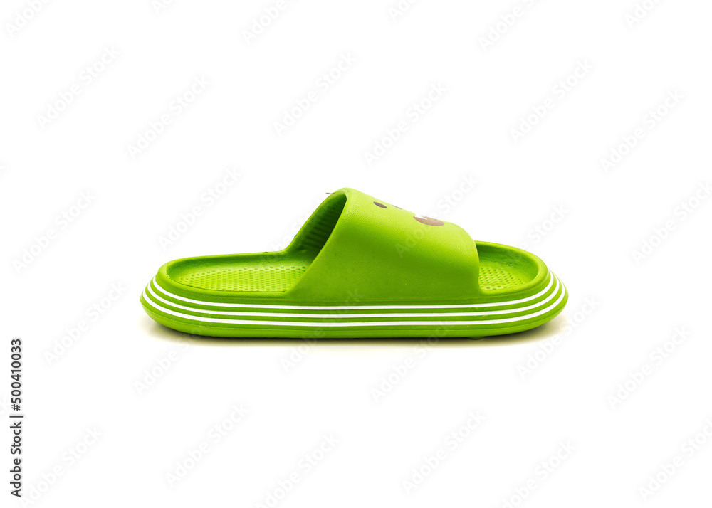 Brand new green open toe pillow slide sandal for toddler non-slip foam slippers isolated on white Brand new green open toe pillow slide sandal for toddler non-slip foam slippers isolated on white