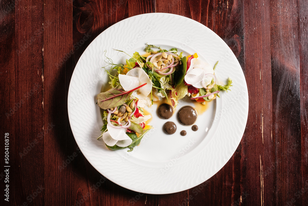 Vegetable salad. Fine vegan dinning menu.