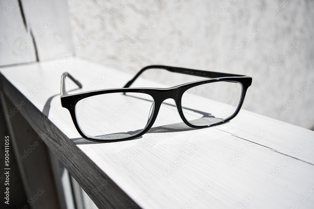 Glasses with clear lenses and black frames