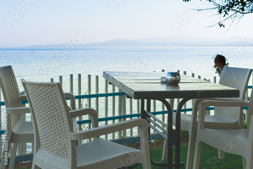 Table and chairs near the sea in the morning in Turkey