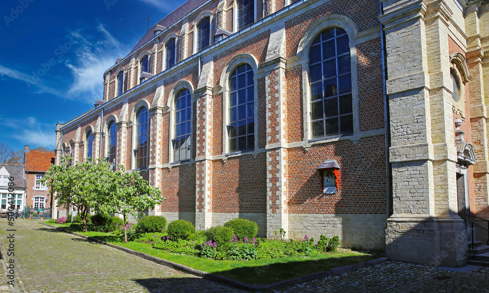 Lier (Begijnhof), Belgium - April 9. 2022: View on old church in medieval unesco world heritage site village on sunny day Lier (Begijnhof), Belgium - April 9. 2022: View on old church in medieval unesco world heritage site village on sunny day