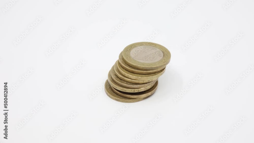 Stack of Turkish coins isolated on white background. Time lapse video
Stack of Turkish coins isolated on white background. Time lapse video