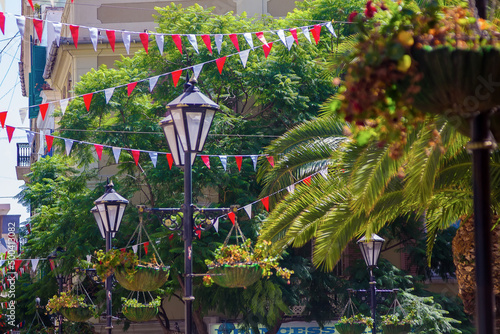 streets decorated with colorful flags in the city of Rock of Gibraltar, Spain