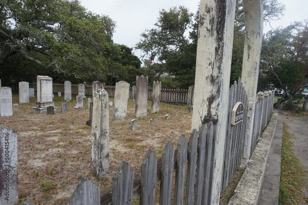 Weathered Island Cemetery with Picket Fence