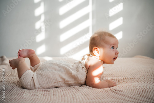 The baby learns to hold its head and roll over on my stomach. The benefits of lying on your stomach for motor development