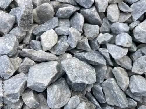 heaped up light gray ballast stones