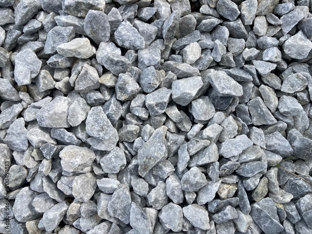heaped up light gray ballast stones heaped up light gray ballast stones