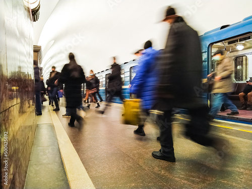 Obraz na płótnie People refugees go from the subway from the city to another country