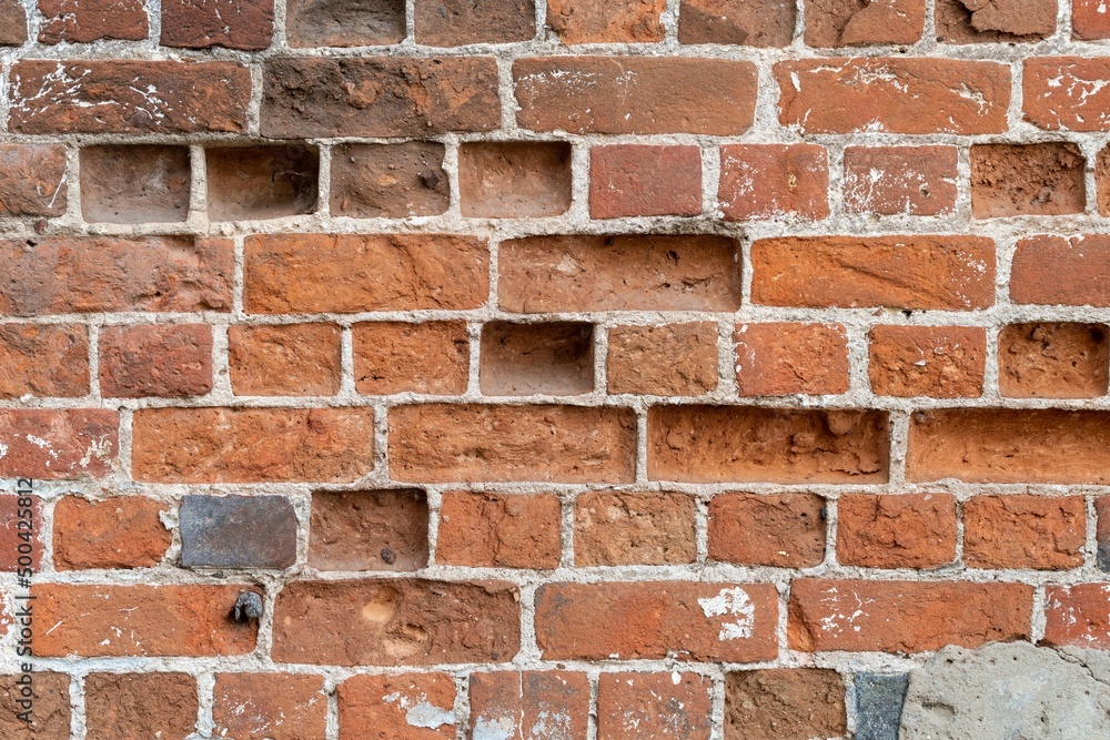 Obraz premium Shabby wall of old red brick. Reference material, reference information.
