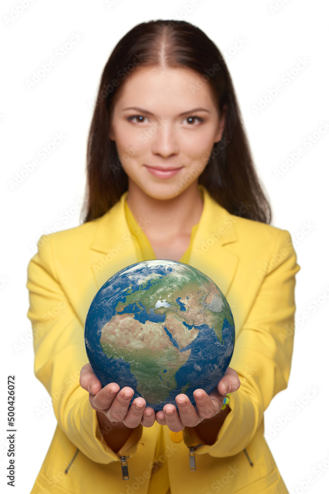 Happy smiling woman holding small earth globe on her palm Happy smiling woman holding small earth globe on her palm