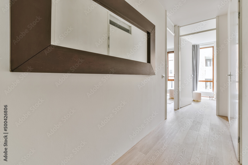 Interior of long corridor in modern apartment Interior of long corridor in modern apartment