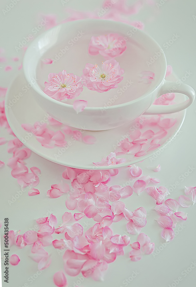 cup of tea with pink flowers